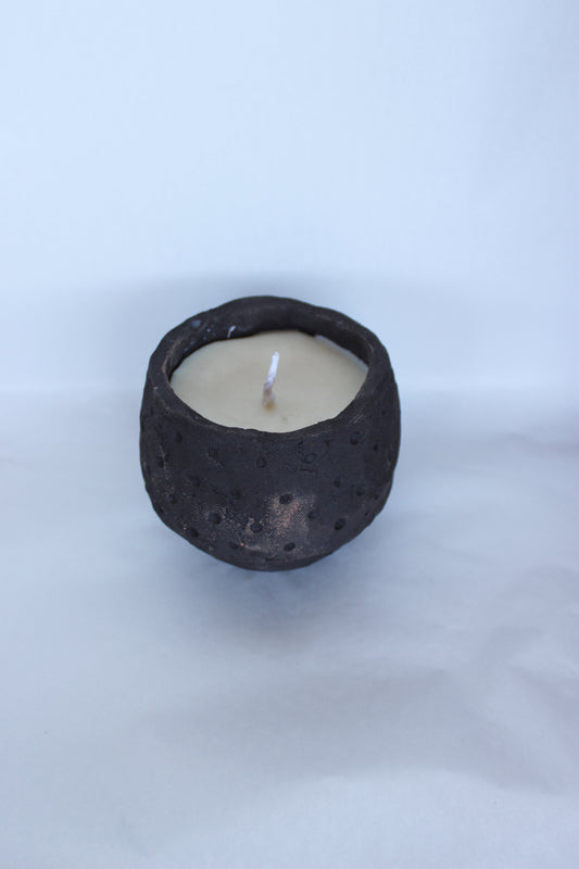 Black Pinchpot with candle